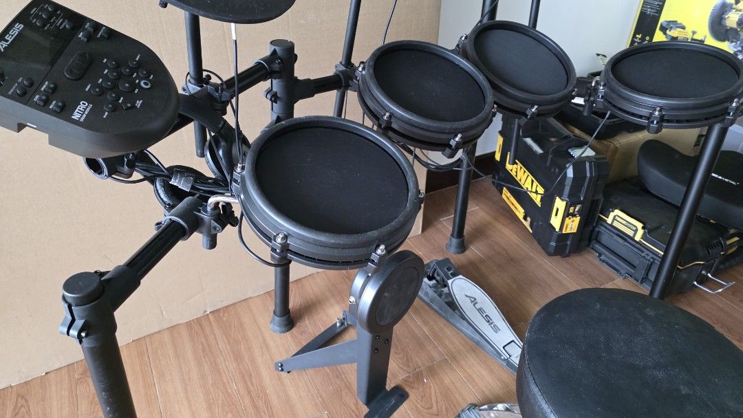 Alesis Nitro Mesh Kit Electronic Drum Set (Category: Musical Instruments) located in Muntinlupa City. Submitted by olxph_822360203 (Listing ID 1455629032, Image 1). Description: - Alesis Nitro Mesh Kit electronic drum set - Includes drum module, pads, and cymbals - Comes with kick pedal and -hat pedal - All necessary cables and rack are included - Ideal for practice sessions or small live performances - Ready for its next drummer!.
