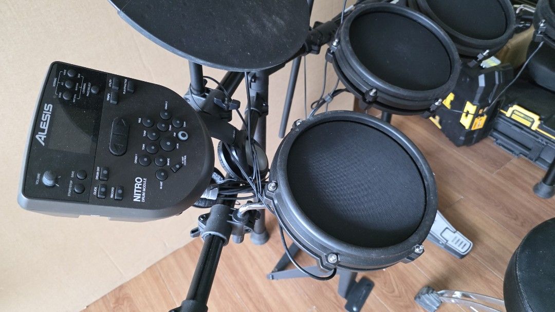 Alesis Nitro Mesh Kit Electronic Drum Set (Category: Musical Instruments) located in Muntinlupa City. Submitted by olxph_822360203 (Listing ID 1455629032, Image 3). Description: - Alesis Nitro Mesh Kit electronic drum set - Includes drum module, pads, and cymbals - Comes with kick pedal and -hat pedal - All necessary cables and rack are included - Ideal for practice sessions or small live performances - Ready for its next drummer!.