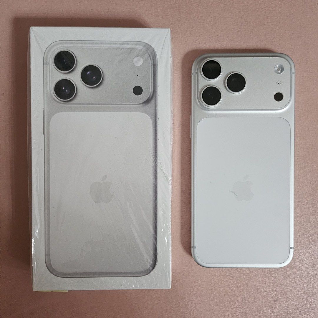 Apple iPhone 17 Pro Max 512 GB (Smart Locked) (Category: iPhone 17 Series) located in Mapandan. Submitted by ljnnjm423 (Listing ID 1455518637, Image 1). Description: Selling my Apple iPhone 17 Pro Max 512 GB (Silver) 80,000 SMART Locked (Smart / TNT / SUN) Local Variant Under warranty til 06/02/2027 Running iOS 26.5.2 (See Screenshot) Battery Health 100% Appearance 10/10 No chips No dents No history of repair PS : Factory resetting the device may