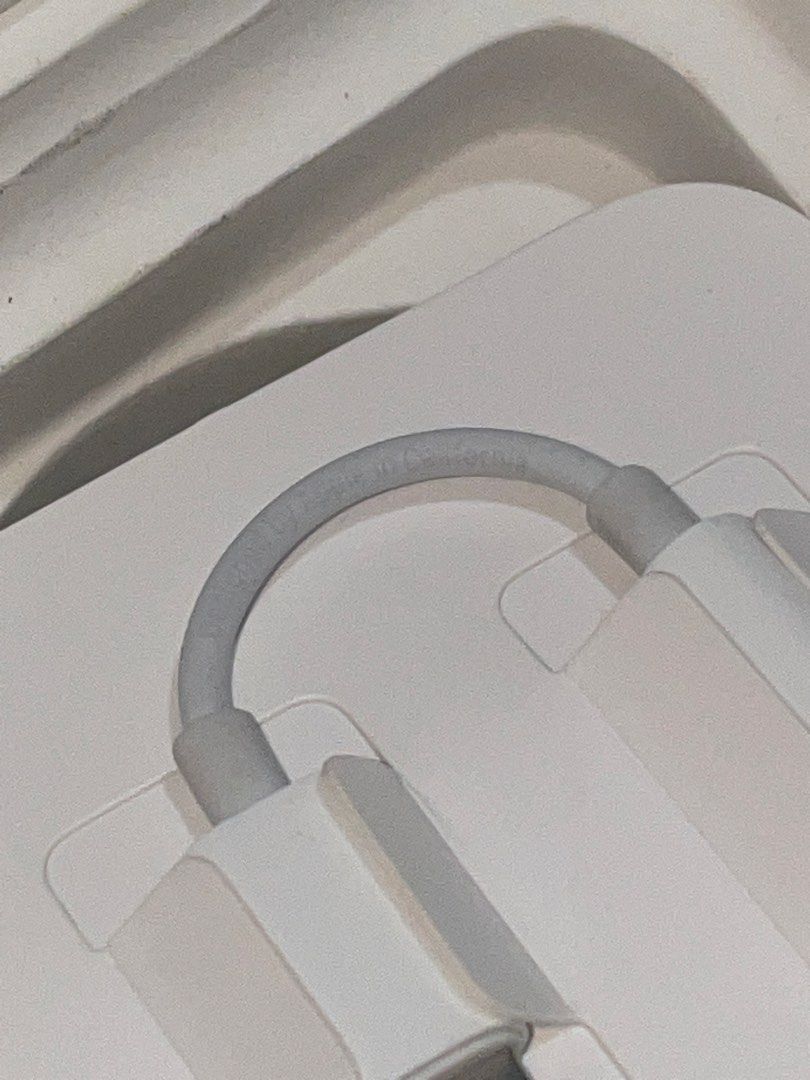 Apple Lighting to 3.5 mm dongle (Category: Headphones & Headsets) located in Lucena. Submitted by allan_rld (Listing ID 1455577003, Image 2). Description: - authentic - with serial number JNT shipment or meet within Lucena City.