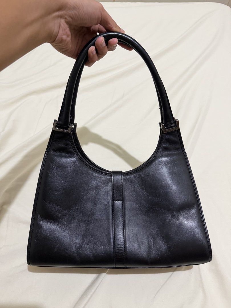 Authentic Gucci Jackie Shoulder Bag (Category: Luxury Bags & Wallets) located in Mexico. Submitted by luxurybyeuphy (Listing ID 1455526754, Image 2). Description: Authentic Gucci Jackie Shoulder Bag Guaranteed orig Moneyback if proven fake Rank AB Needs cleaning Pressmarks in front and back Price is negotiable.