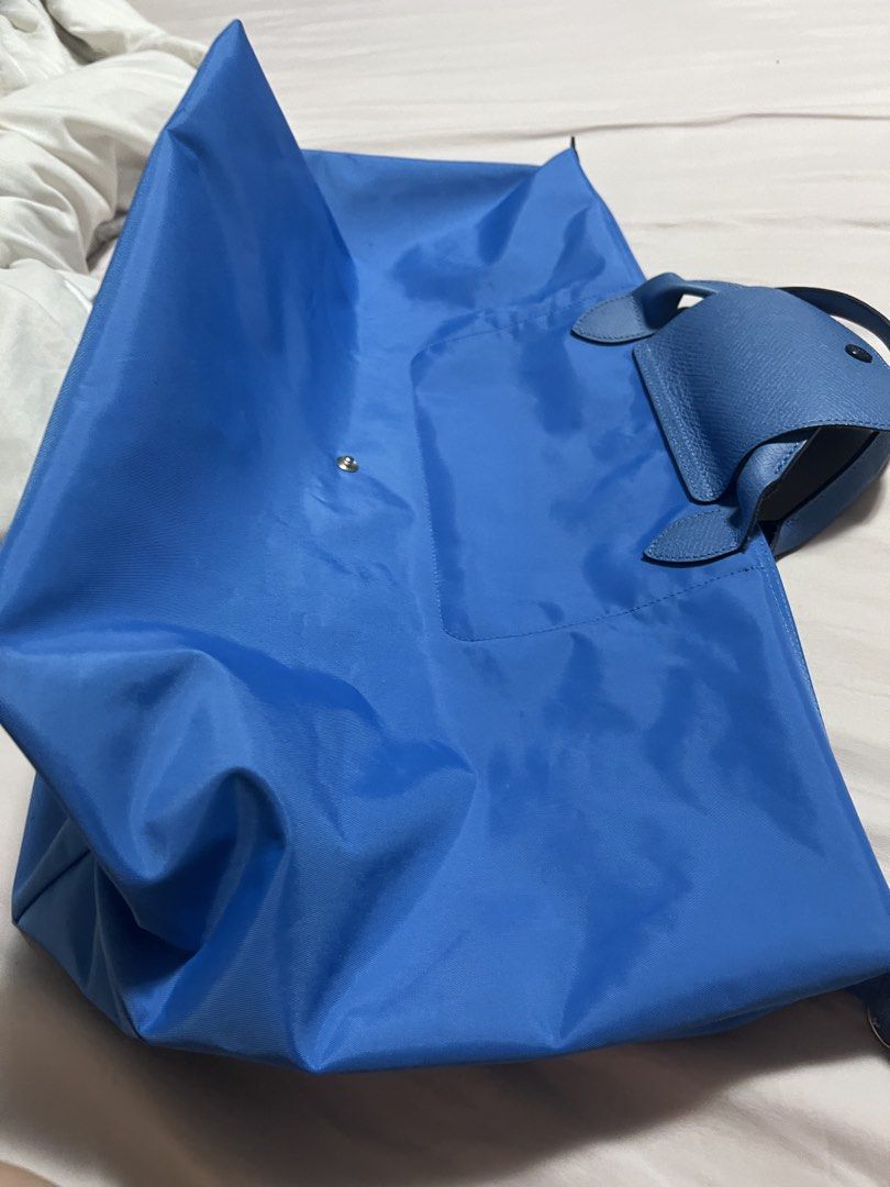 Authentic Longchamp Travel size (Category: Tote Bags) located in Cavite. Submitted by corp22 (Listing ID 1455627473, Image 3). Description: Extra Large Longchamp, very good for travel use and very spacious. From Paris.