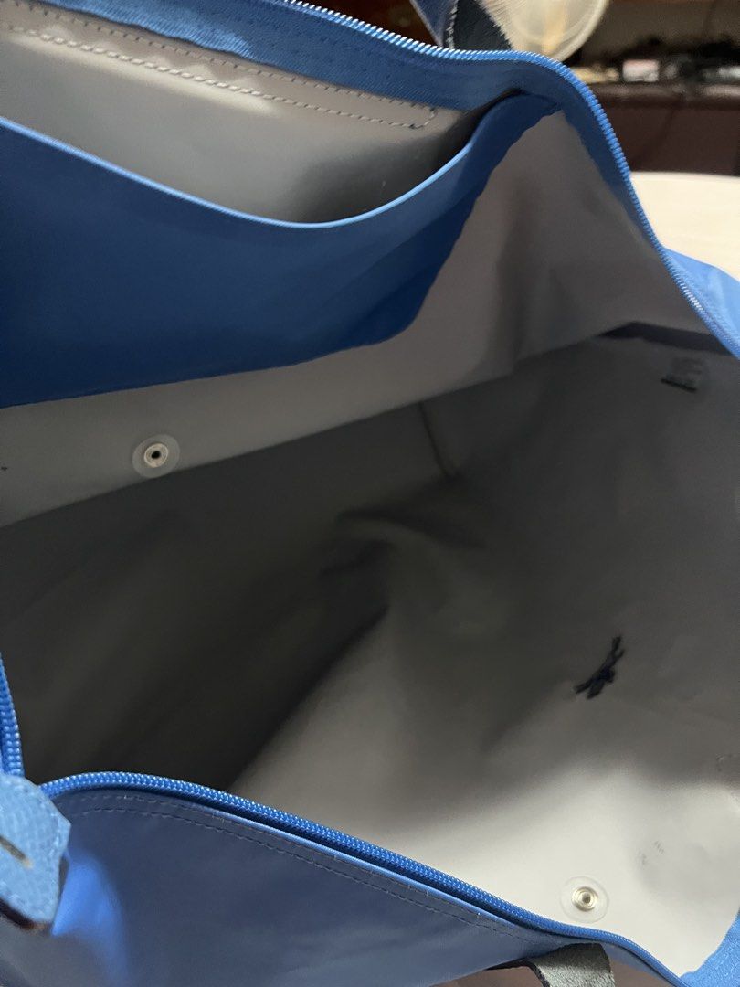 Authentic Longchamp Travel size (Category: Tote Bags) located in Cavite. Submitted by corp22 (Listing ID 1455627473, Image 1). Description: Extra Large Longchamp, very good for travel use and very spacious. From Paris.