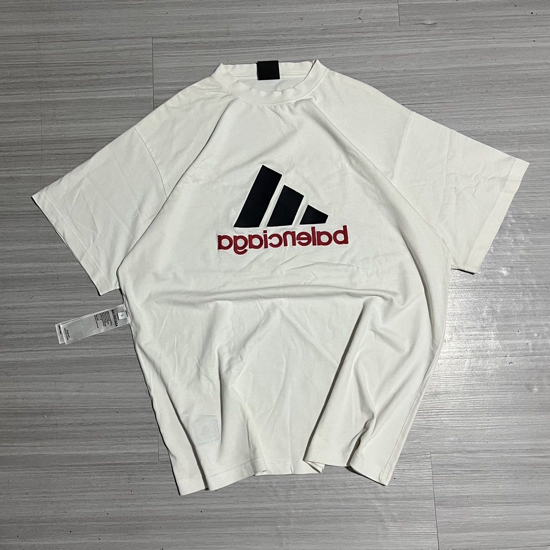 BALENCIAGA X ADIDAS EMBROIDED (Category: Luxury Apparel) located in Iloilo. Submitted by thrift2cali (Listing ID 1455670796, Image 1). Description: ITEM NAME: BALENCIAGA X ADIDAS EMBROIDED DIMES: 24 / 30 SIZE: XL CONDITION: LIKE NEW ISSUE: NONE ₱ PM COLOR MAY VARY DUE TO LIGHTING - ADD SF OUTSIDE ILL CITY!.