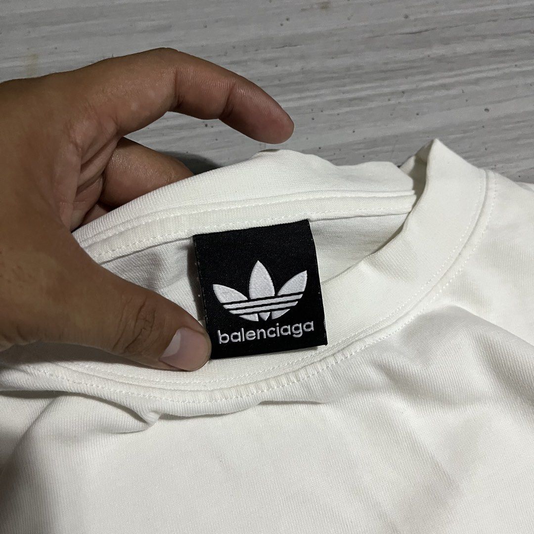 BALENCIAGA X ADIDAS EMBROIDED (Category: Luxury Apparel) located in Iloilo. Submitted by thrift2cali (Listing ID 1455670796, Image 3). Description: ITEM NAME: BALENCIAGA X ADIDAS EMBROIDED DIMES: 24 / 30 SIZE: XL CONDITION: LIKE NEW ISSUE: NONE ₱ PM COLOR MAY VARY DUE TO LIGHTING - ADD SF OUTSIDE ILL CITY!.