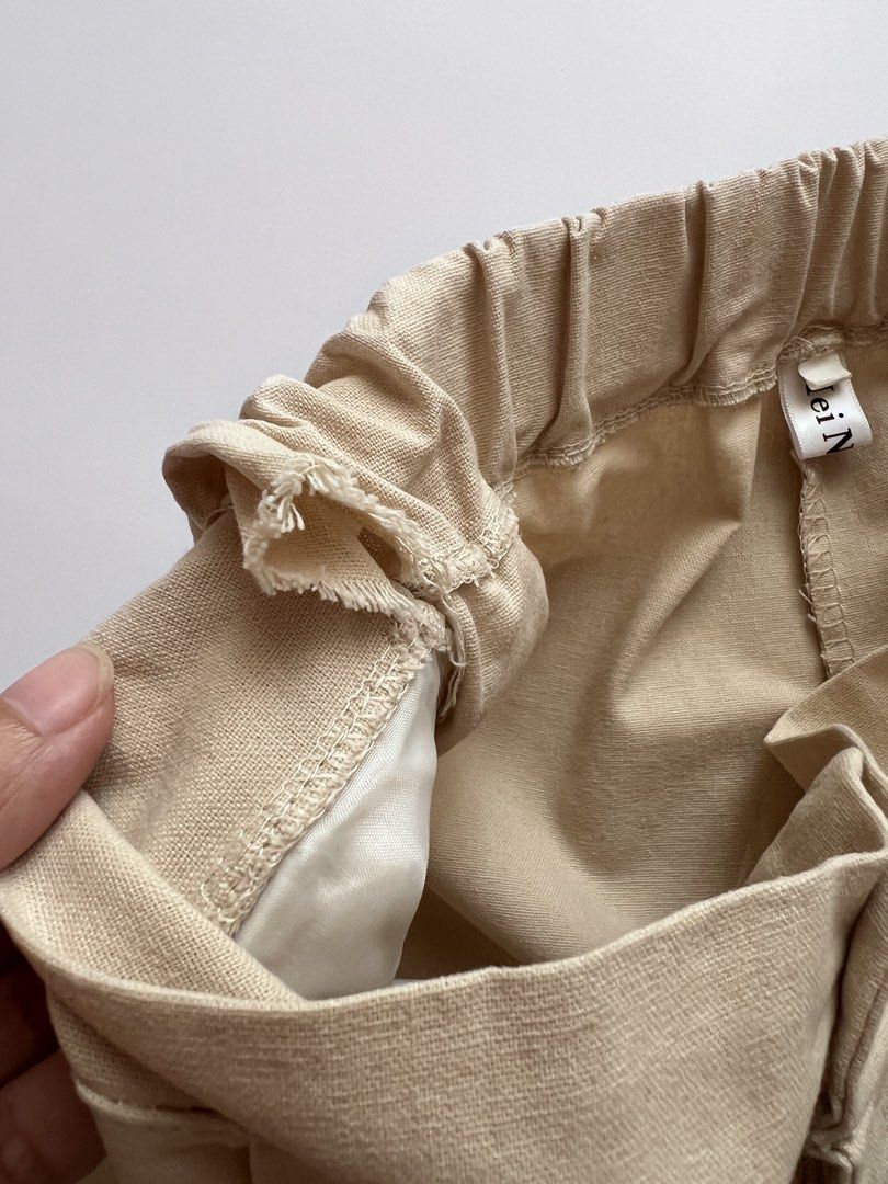 beige calf length trousers (Category: Other Bottoms) located in Dasmarinas. Submitted by pinex (Listing ID 1455621963, Image 2). Description: - bought this in sh**** - material is linen-like - garterized back - part of the seam on the waist has unravelled, garter still okay and it’s unnoticeable when worn - L: 30.5 in. - W: 13-15 in.