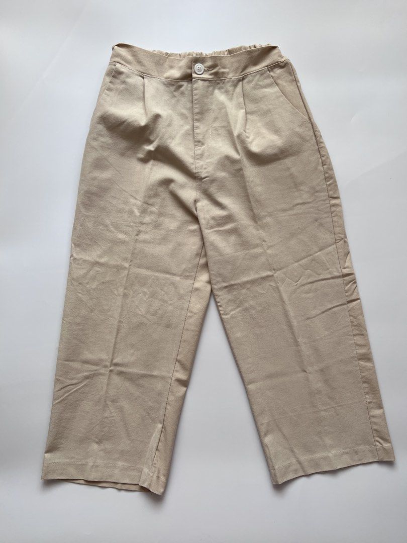beige calf length trousers (Category: Other Bottoms) located in Dasmarinas. Submitted by pinex (Listing ID 1455621963, Image 1). Description: - bought this in sh**** - material is linen-like - garterized back - part of the seam on the waist has unravelled, garter still okay and it’s unnoticeable when worn - L: 30.5 in. - W: 13-15 in.