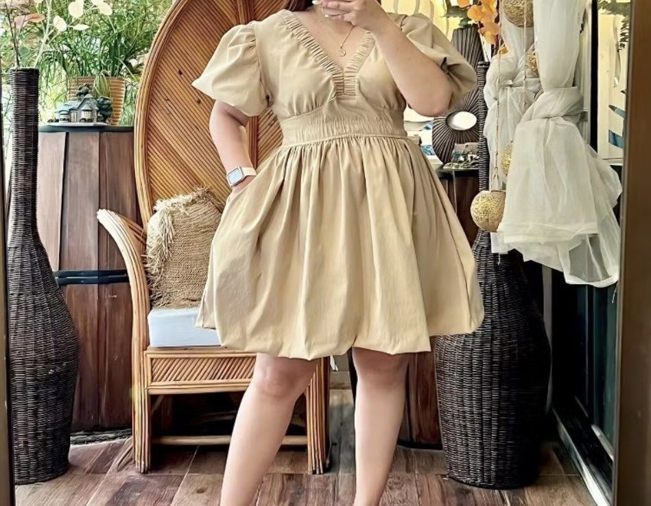 Beige Puff Sleeve V-Neck Mini Dress (Category: Dresses) located in Manila. Submitted by dleih (Listing ID 1455630145, Image 1). Description: SIZE XL to 3XL - Cute beige mini dress - Puff sleeves - Gathered V-neckline - Cinched waist - Fun bubble hem skirt - Ideal for casual wear or brunch dates - Comfortable and easy to wear.