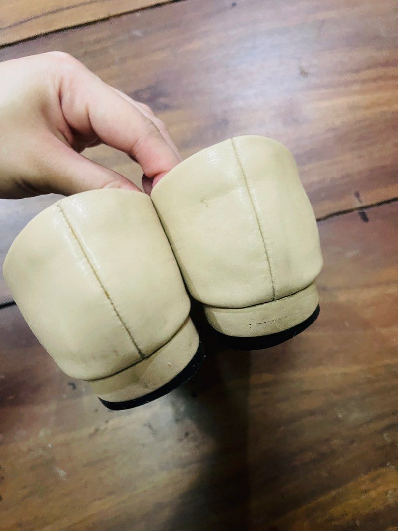 Beige Two Tone Cap Toe Ballet Flats (Category: Flats & Sandals) located in Quezon City. Submitted by prelovedluxe_ (Listing ID 1455577399, Image 3). Description: Well used with signs of wear and dirt on lining, exterior, and soles. Soles are intact, no damage on lining. US size 7.5 to 8, insole 24 cm. Shipping fee care of buyer..