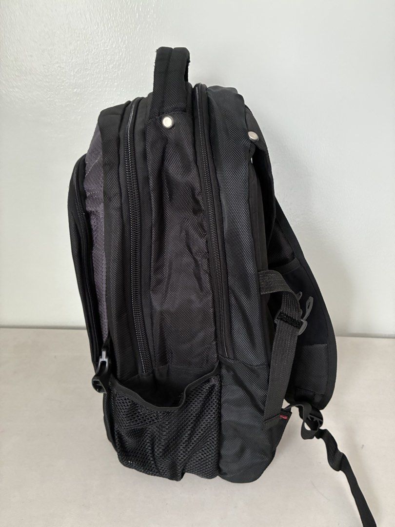 Black Backpack with Grey Accents (Category: Backpacks) located in Manila. Submitted by snappyaura (Listing ID 1455615147, Image 2). Description: - Durable black backpack with a stylish grey textured front panel. - Multiple zippered compartments to keep your belongings organized. - Convenient side mesh pockets for water bottles. - Padded shoulder straps and back panel for maximum comfort. - Ideal for school, work, or your next travel adventure..