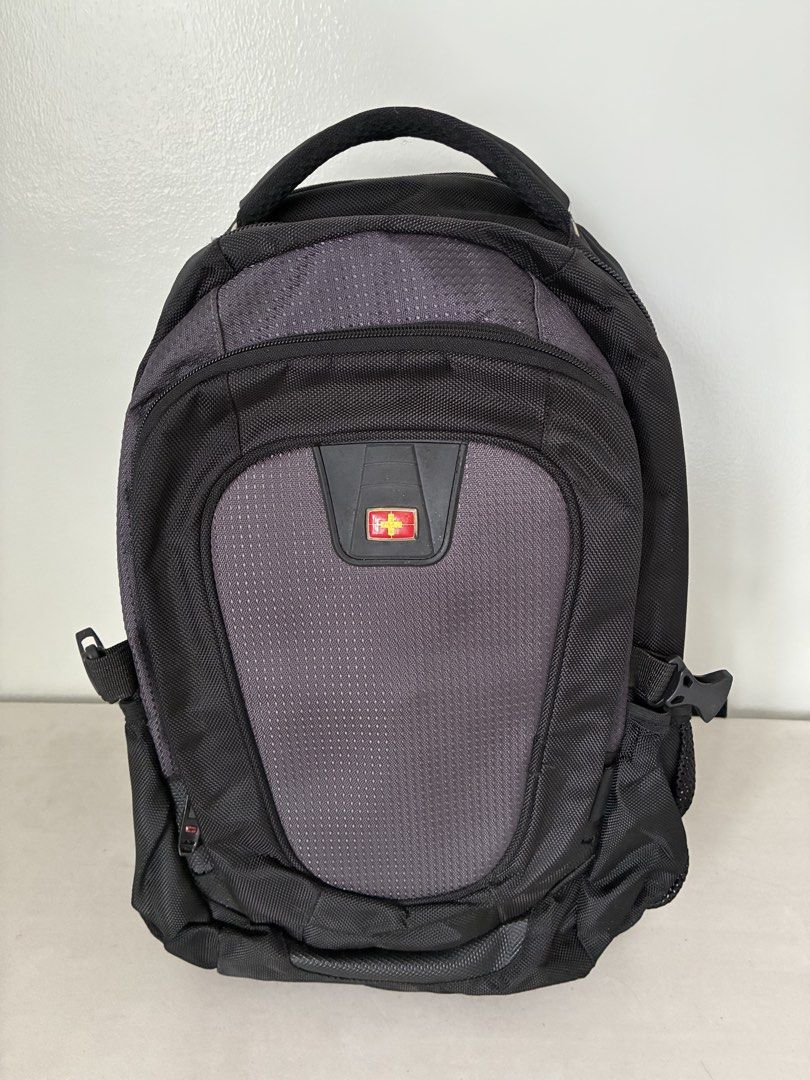 Black Backpack with Grey Accents (Category: Backpacks) located in Manila. Submitted by snappyaura (Listing ID 1455615147, Image 1). Description: - Durable black backpack with a stylish grey textured front panel. - Multiple zippered compartments to keep your belongings organized. - Convenient side mesh pockets for water bottles. - Padded shoulder straps and back panel for maximum comfort. - Ideal for school, work, or your next travel adventure..