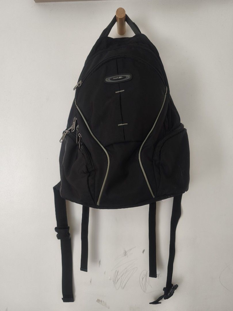 Black Backpack with Multiple Compartments (Category: Backpacks) located in San Pedro. Submitted by rakaswall (Listing ID 1455624478, Image 1). Description: - Black backpack - Main compartment and front pockets - Padded back and straps for comfort - Zippers in good working condition - Plenty of interior space - Minor exterior scuffs, overall good shape - Ideal for school or day trips.