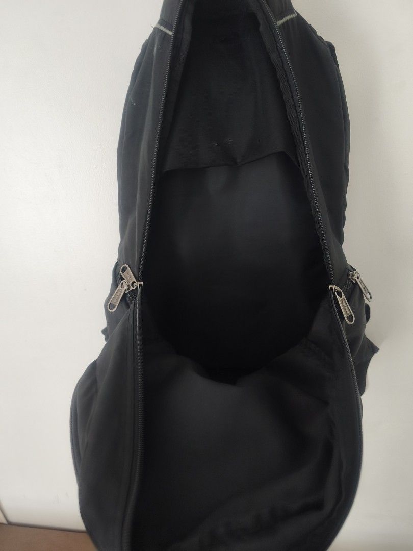 Black Backpack with Multiple Compartments (Category: Backpacks) located in San Pedro. Submitted by rakaswall (Listing ID 1455624478, Image 3). Description: - Black backpack - Main compartment and front pockets - Padded back and straps for comfort - Zippers in good working condition - Plenty of interior space - Minor exterior scuffs, overall good shape - Ideal for school or day trips.