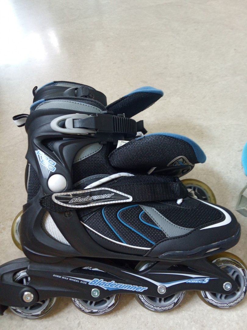 BladeRunner Inline Skates (Category: Skates, Rollerblades & Scooters) located in Singapore. Submitted by vinsonfran51619 (Listing ID 1455515321, Image 1). Description: - BladeRunner inline skates - Colour: Black with blue accents - Adjustable size (fits ages 5+) - Secure fit with buckle and velcro straps - 60mm maximum wheel size - Perfect for recreational skating and fun!.