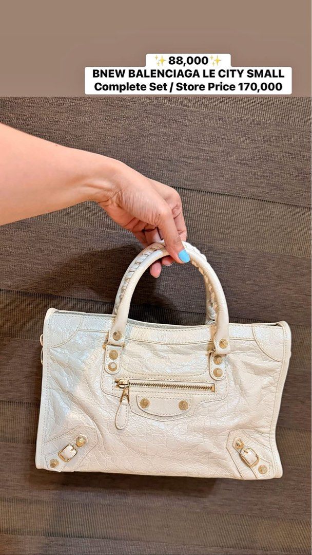 BNEW BALENCIAGA LE CITY SMALL Complete Set (Category: Luxury Bags & Wallets) located in Manila. Submitted by sweetluxuryph (Listing ID 1455626071, Image 1). Description: - Authentic White Balenciaga Le City Bag - Small Size - Comes with Complete Set - Original Store Price: PHP 170,000 - Excellent Deal Available!.