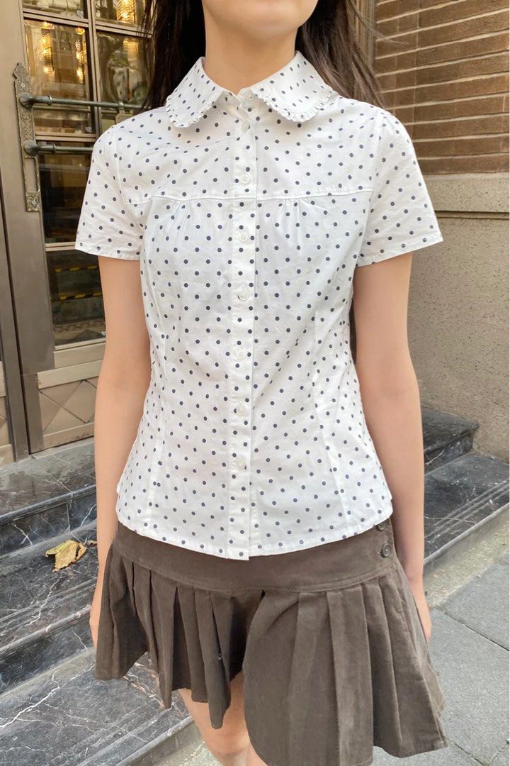 Brandy Melville Teagan — Polka Dot Polo (Category: Blouses) located in Manila. Submitted by brandycornerph (Listing ID 1455656087, Image 1). Description: ⊹ brandy melville — teagan ⊹ available colors: • polka dot (1) ₱1,880 each 🩵 ⊹ brand new with tags ⊹ onhand & ready to ship 🇵🇭 message us to mine ♡ #BrandyCornerPH #BrandyMelvillePH #TeaganTop #BrandyMelvilleTop .