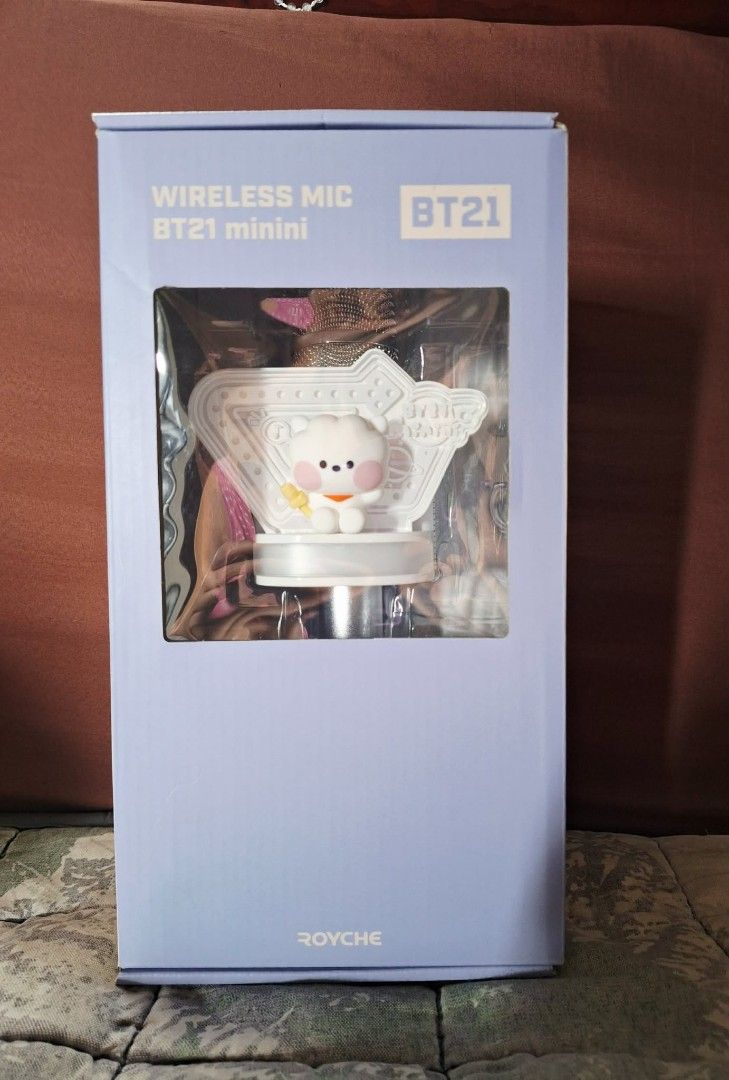BT21 minini Wireless Mic by ROYCHE (Category: Microphones) located in Angono. Submitted by enzmhyjm3 (Listing ID 1455625602, Image 1). Description: - BT21 minini wireless microphone - Features the adorable RJ character - Comes in original packaging with user manual included - Perfect for BT21 fans - Easy wireless connectivity.