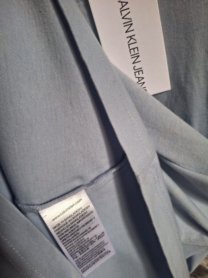 CALVIN KLEIN (Category: Tshirts & Polo Shirts ) located in Bulacan. Submitted by stacksonracks_ph (Listing ID 1390522315, Image 3). Description: Color: Powder Blue Length: 30 inches Width: 24 inches Sleeve length: 9 inches.