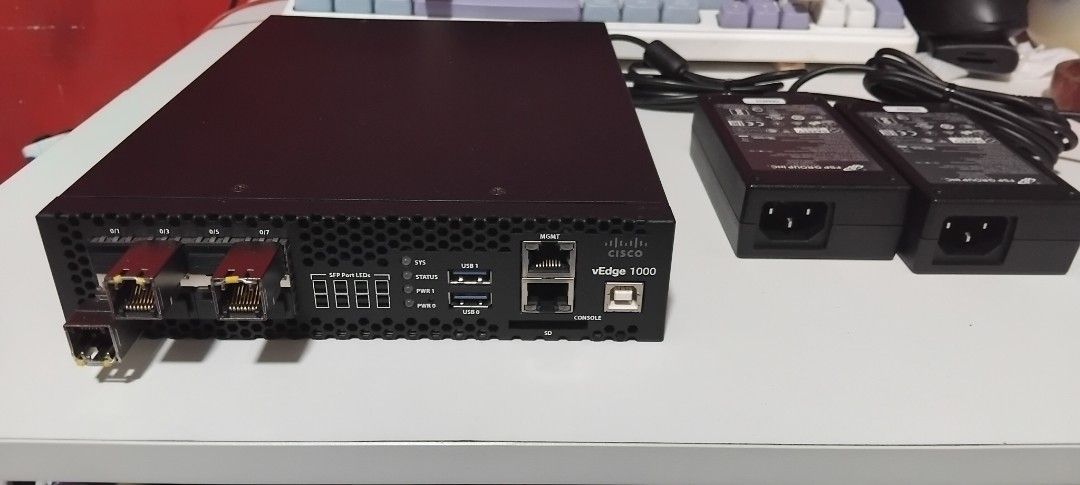 Cisco vEdge 1000 Router with Power Adapters (Category: Networking) located in Quezon City. Submitted by ckonlaynshap (Listing ID 1455522545, Image 2). Description: - Negotiable - Cisco vEdge 1000 Router - Tested and working condition - Includes 2 power adapters - Multiple connectivity ports: SFP, USB, MGMT, Console - Ideal for various network configurations.