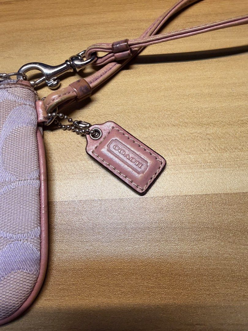 Coach Wrislet (Category: Luxury Bags & Wallets) located in Naga. Submitted by sushiiiiislurt (Listing ID 1455601036, Image 3). Description: Coach Wristlet 💜 Authentic Coach wristlet from Japan 🇯🇵 Cute lavender/pink monogram design with wrist strap and zipper closure. Perfect for keeping cards, cash, keys, or small essentials organized. ✨ Price: ₱2,500 📍 From Japan 📦 Pre-loved.
