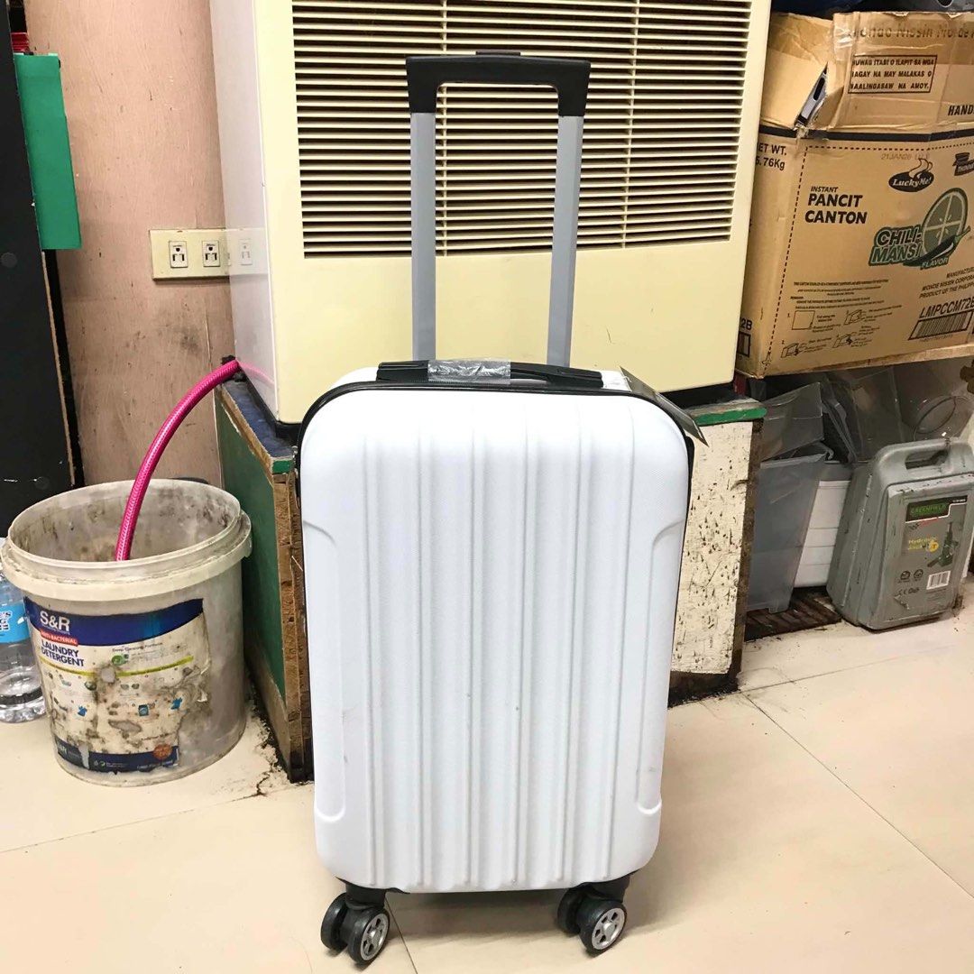 COMPACT Rolling Carry-on Small Hardshell Travel Luggage Suitcase (Category: Luggage) located in Pasay City. Submitted by meostore (Listing ID 1455534631, Image 1). Description: COMPACT Rolling Carry-on Small Hardshell Travel Luggage Suitcase -Brand: Non-branded -Approx. meas.: H 22” x L 13” x W 9” -Material: Polycarbonate PP plastic -Compact box-style; Standard cabin size; Spinner wheels NOTE: Luggage has existing damaged portion. Actual photos p