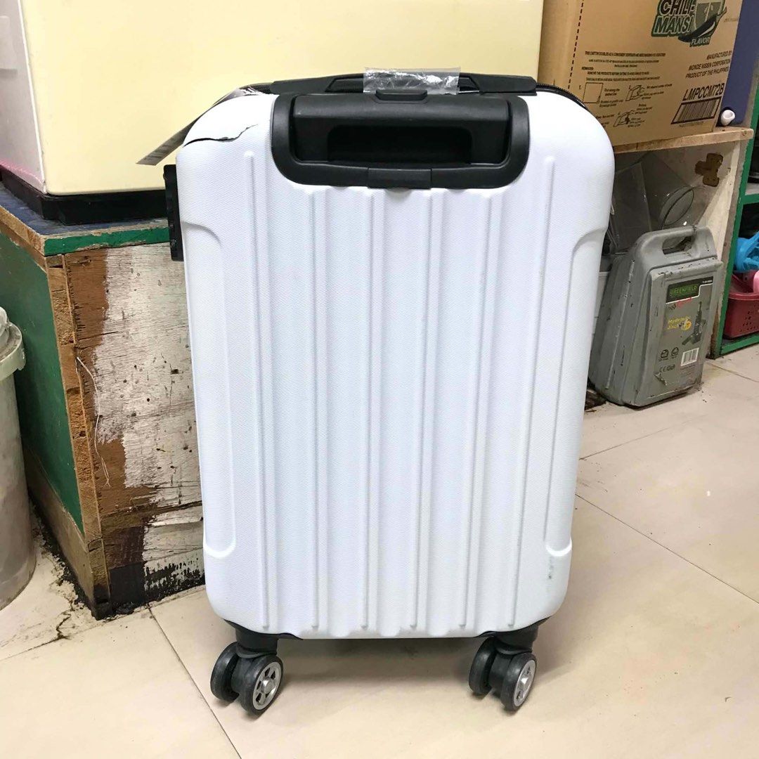 COMPACT Rolling Carry-on Small Hardshell Travel Luggage Suitcase (Category: Luggage) located in Pasay City. Submitted by meostore (Listing ID 1455534631, Image 2). Description: COMPACT Rolling Carry-on Small Hardshell Travel Luggage Suitcase -Brand: Non-branded -Approx. meas.: H 22” x L 13” x W 9” -Material: Polycarbonate PP plastic -Compact box-style; Standard cabin size; Spinner wheels NOTE: Luggage has existing damaged portion. Actual photos p