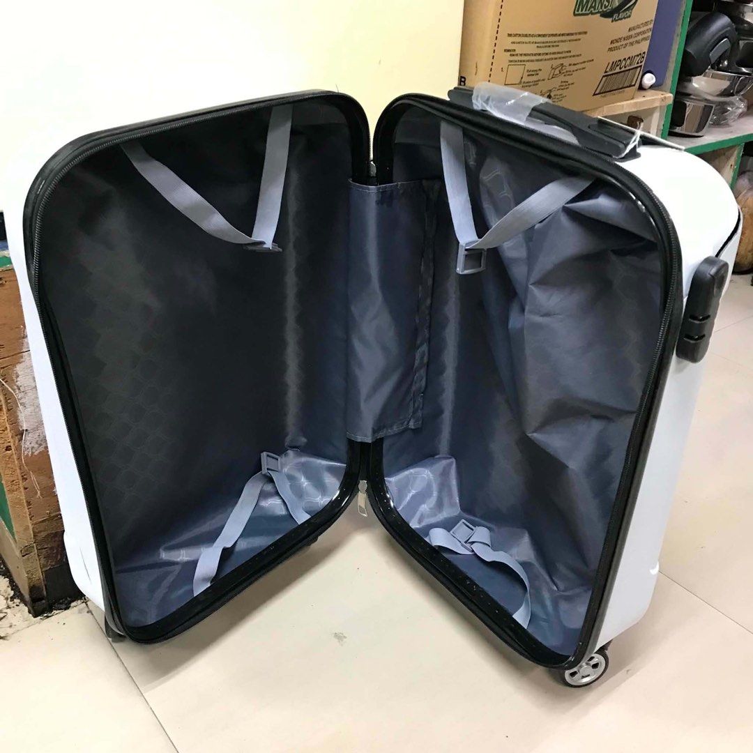 COMPACT Rolling Carry-on Small Hardshell Travel Luggage Suitcase (Category: Luggage) located in Pasay City. Submitted by meostore (Listing ID 1455534631, Image 3). Description: COMPACT Rolling Carry-on Small Hardshell Travel Luggage Suitcase -Brand: Non-branded -Approx. meas.: H 22” x L 13” x W 9” -Material: Polycarbonate PP plastic -Compact box-style; Standard cabin size; Spinner wheels NOTE: Luggage has existing damaged portion. Actual photos p