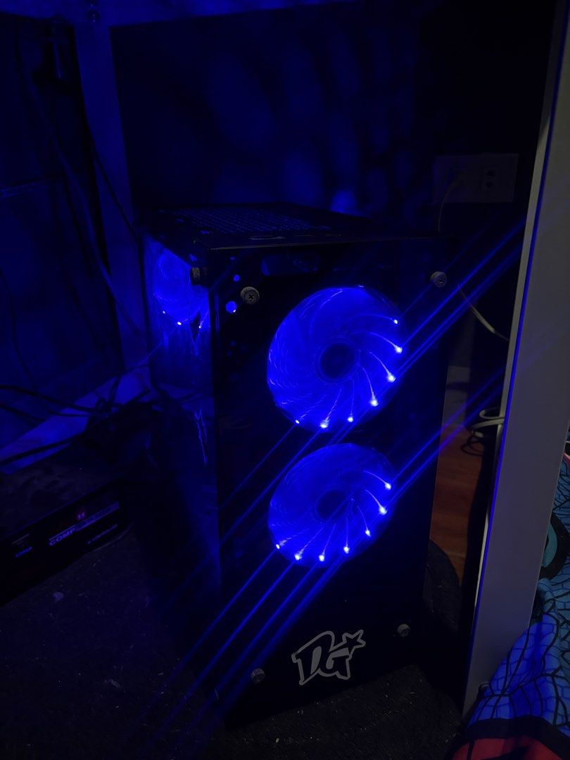 Custom Gaming PC with Blue LED Fans (Category: Desktops) located in Cavite. Submitted by kentcomp (Listing ID 1455673815, Image 2). Description: Device Name DESKTOP-4DJO9KK Processor AMD Ryzen 3 2200G with Radeon Vega Graphics 3.50 GHz Installed RAM 4.00 GB (3.45 GB usable) Storage 238 GB SSD TEAM T253256GB, 466 GB HDD WDC WD5000AAKX-22ERMA0 Graphics Card AMD Radeon(TM) Vega 8 Graphics (497 MB) Device ID 063FA373-56D2-40A7-B273-CDE6D36FE5F2 Produ