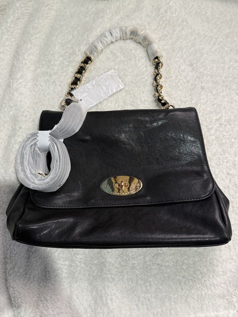 DAVID JONES Black Leather Chain Shoulder Bag (Category: Shoulder Bags) located in Manila. Submitted by caz22 (Listing ID 1455597154, Image 1). Description: - Brand: DAVID JONES - Color: Black - Material: Leather - Features: Gold chain strap, gold clasp closure - Includes: Detachable long strap - Condition: Brand new, never used, with original tags attached.