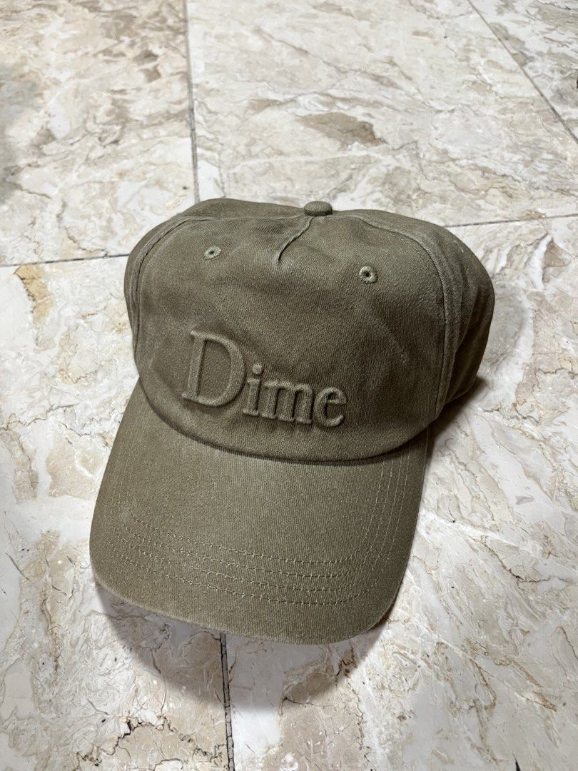 DIME CLASSIC EMBOSSED UNIFORM HAT (Category: Caps & Hats) located in Quezon City. Submitted by headline. (Listing ID 1455658025, Image 2). Description: DIME CLASSIC EMBOSSED UNIFORM HAT UNSTRUCTURED GOLD WASH PANEL HAT EXCELLENT CONDITION FOR ONLY:2,650php +SHIPPING FEE.