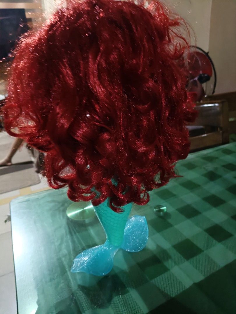 Disney Princess Ariel Singing Doll (Category: Kids Toys) located in Angeles City. Submitted by mysticdeer-32c4 (Listing ID 1455646463, Image 2). Description: - Singing Ariel doll from Disney - Features iconic mermaid tail and seashell top - Long, flowing red hair - Press her seashell necklace to hear her sing - Perfect for any Disney fan - Batteries required (not included).