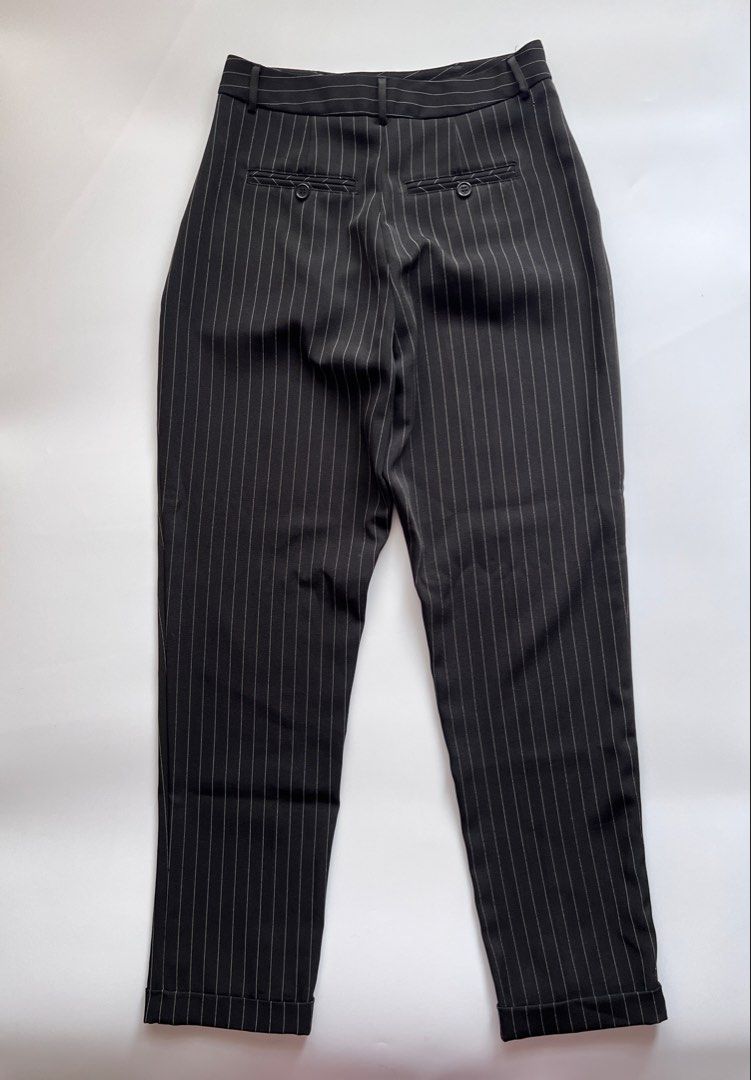 f21 pinstripe trousers (Category: Other Bottoms) located in Dasmarinas. Submitted by pinex (Listing ID 1455621209, Image 3). Description: - forever21 black pinstriped trousers - cuffed hem - L: 38in - W: 13.5in laid flat.