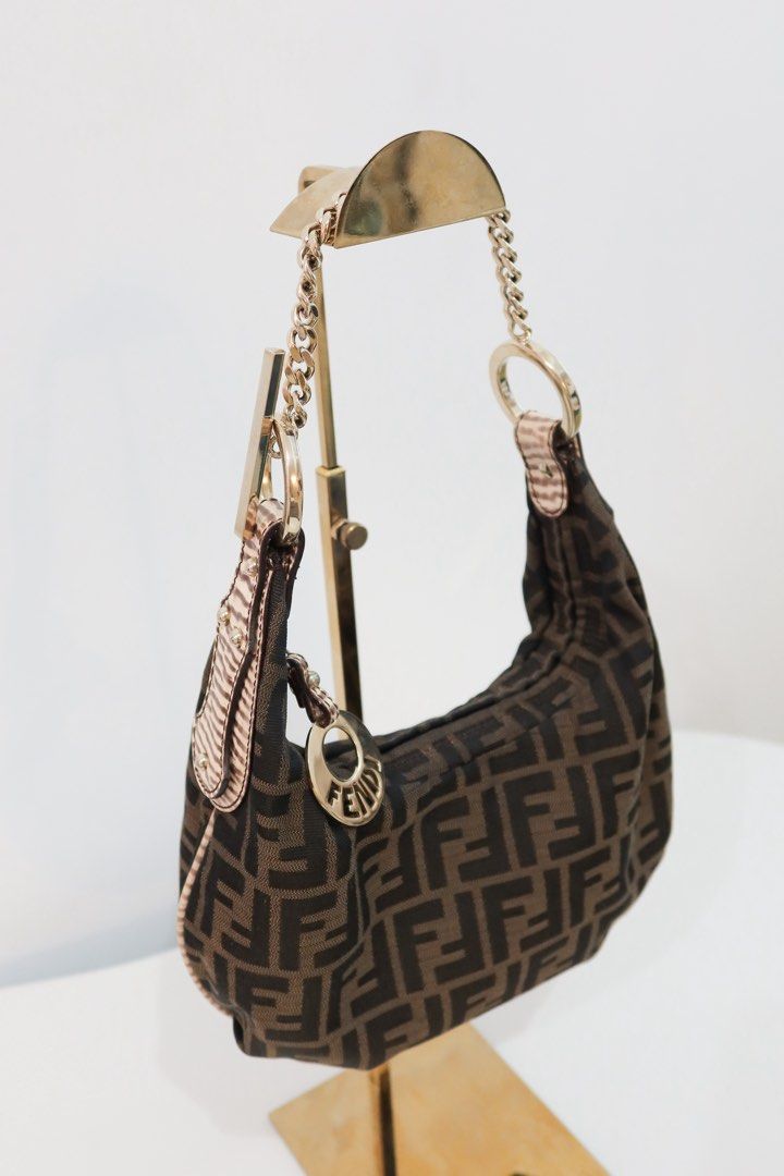 Fendi Zucca Canvas Chef Chain Hobo Bag (Category: Luxury Bags & Wallets) located in Taguig. Submitted by luxelobbyofficial (Listing ID 1455511293, Image 2). Description: 🏷️ ₱55,000 • Rank: A • 100% Authentic • With Entrupy Certificate • Pre-Owned • No inclusions _ Disclaimer: Luxe Lobby is an independent entity and is neither affiliated with nor endorsed by any of the brands displayed on this page. All trademarks, service marks, and brand names 
