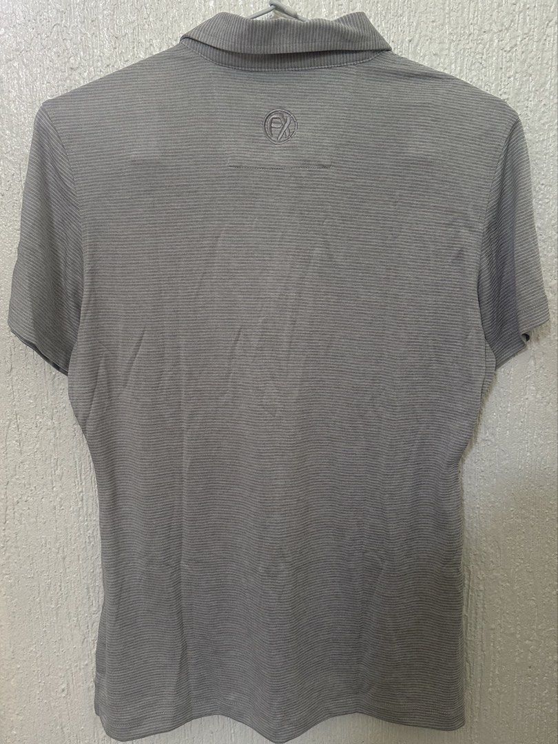 Fenix Grey Golf Polo (Category: Activewear) located in Muntinlupa City. Submitted by mykaroms (Listing ID 1455622097, Image 2). Description: Fenix Grey Golf Polo Drifit material Only used once Size L Material is very light and airy Fits me a bit loose (36C bust) Negotiable only if you purchase 3 items or more Delivery via Gogoxpress only (other forms of delivery must be book by buyer) .