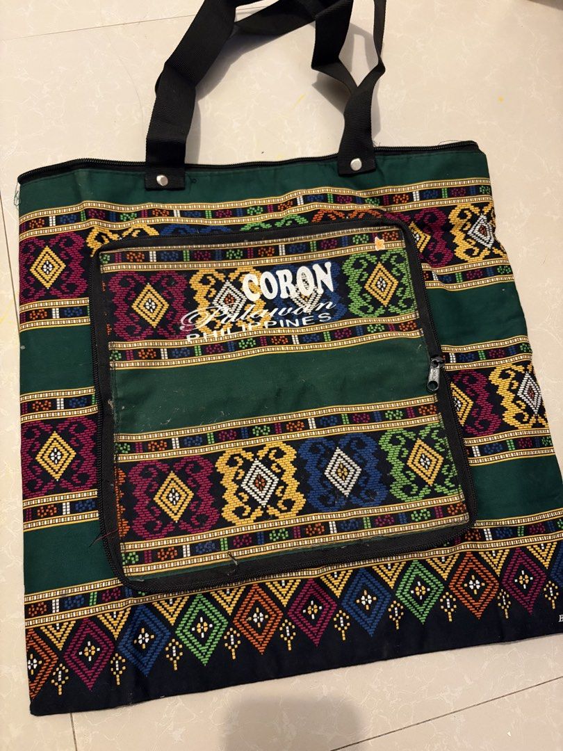 Foldable Palawan Tote Bag (Category: Tote Bags) located in Las Pinas. Submitted by bibliomomma (Listing ID 1455511377, Image 1). Description: Batik tote bag from Palawan, bought as pasalubong. Used only once and has been stored since, as I’m no longer using it. In excellent condition with a beautiful patterned design..