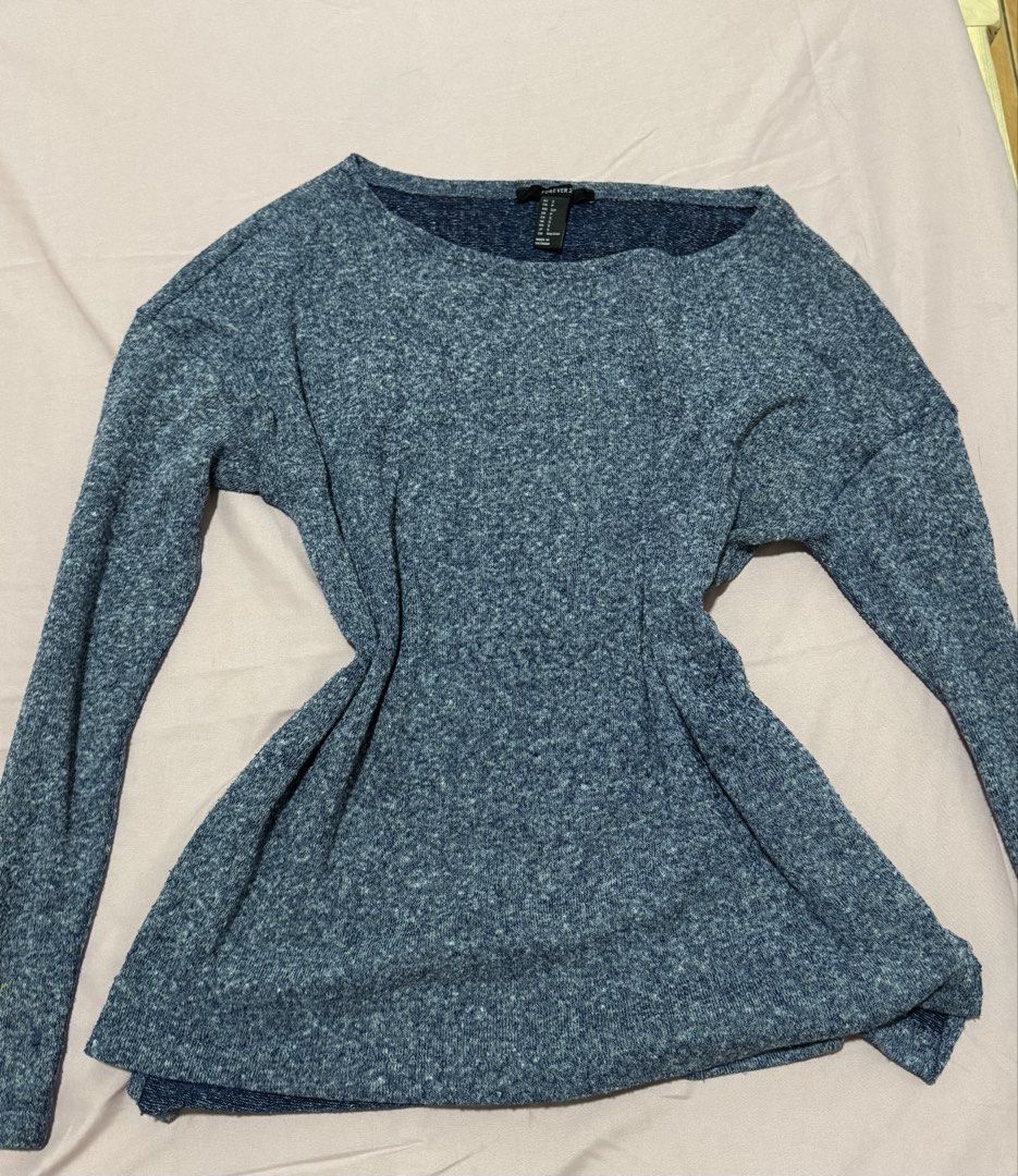 Forever 21 Blue Marled Long Sleeve Sweater (Category: Longsleeves) located in Muntinlupa City. Submitted by sunwonx (Listing ID 1455606503, Image 1). Description: - Comfy blue marled sweater - Brand: Forever 21 - Style: Long sleeves, relaxed fit - Features: Slightly flared hem - Versatile: Great for casual wear or layering - Easy to pair with jeans or leggings.