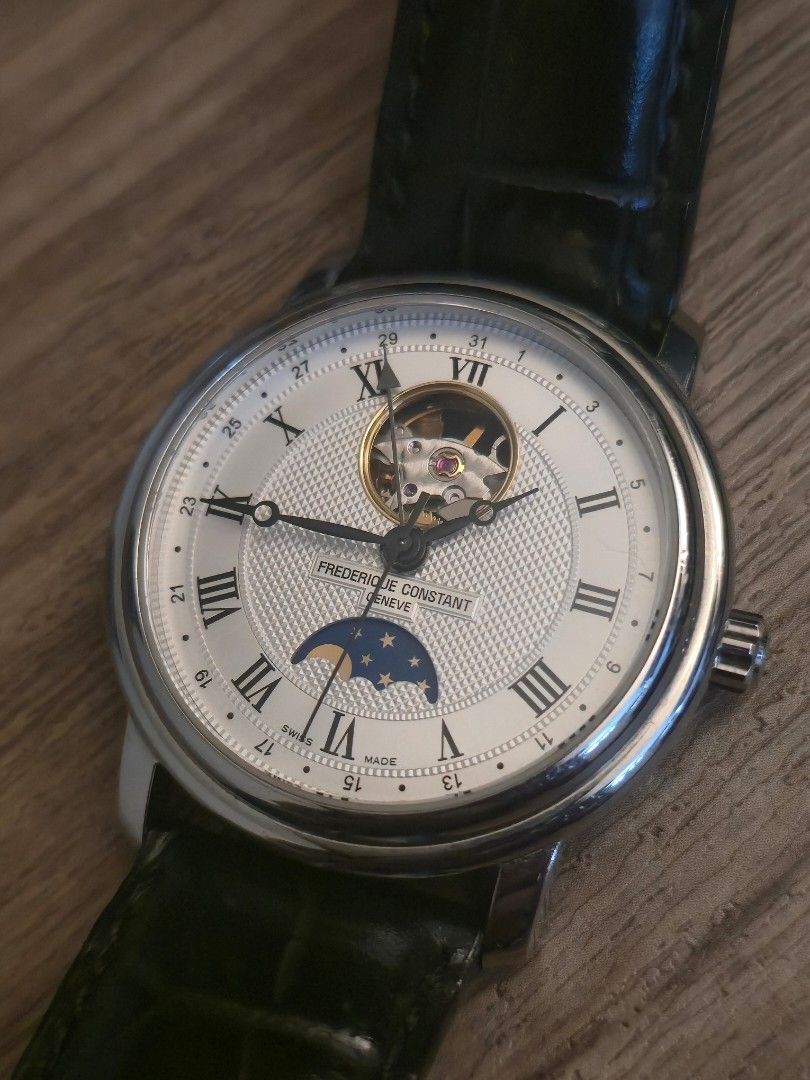Frederique Constant Moonphase Automatic Watch (Category: Luxury Watches) located in Taguig. Submitted by homelander27 (Listing ID 1455673330, Image 2). Description: Frederique Constant Classics Moonphase Reference: FC-335MC4P6 Case: L(40-44) MM Case: 40 Case Back: Crystal Watch face: Open Movement Silver Movement: Automatic Strap: Leather Watch Crystal: AR Sapphire Included Accessories: None Watch only, No box (Acquired via watch trade).