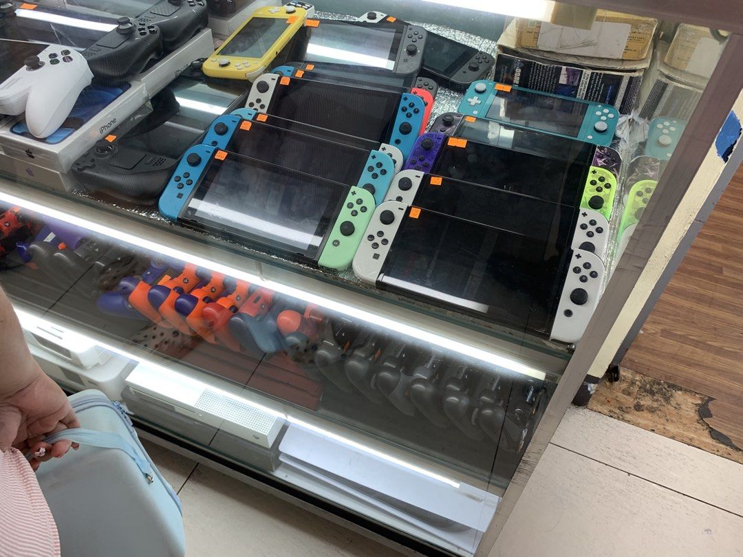 Gaming shop (Category: Nintendo) located in San Juan City. Submitted by safe.trusted_legitseller (Listing ID 1455600798, Image 2). Description: For sale: 1. 🎮 PS5 games 2. 🎮 PS4 games 3. 🎮 Nintendo Switch games 4. 🕹️ PS5 controllers / DualSense 5. 🕹️ Nintendo Switch consoles 6. 🎮 Switch Joy-Con 7. 🎮 Handheld gaming consoles 8. 📽️ Projectors 9. 🎮 Used gaming bundles.