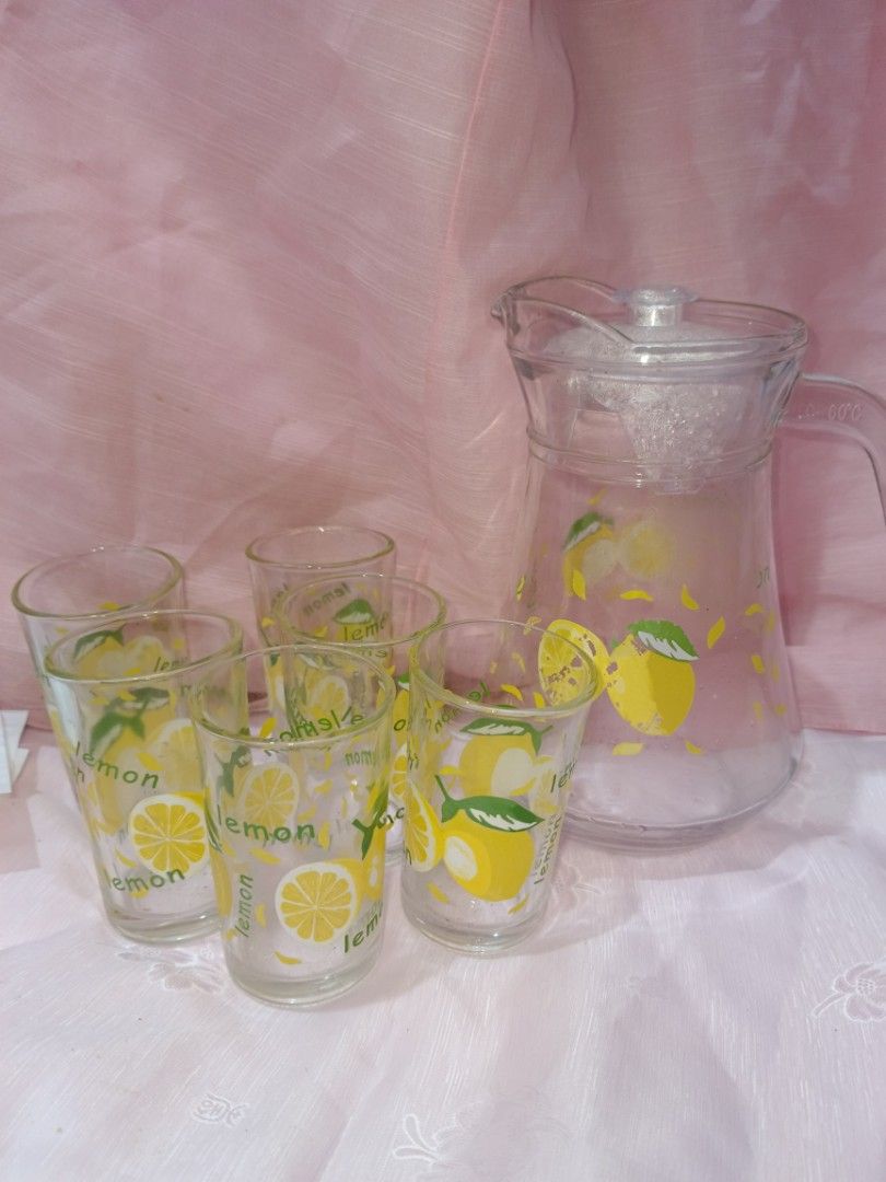 Glass Lemon Print Pitcher and 5 Glasses Set (Category: Other Kitchenware & Tableware) located in Valenzuela. Submitted by relchris22 (Listing ID 1455568717, Image 2). Description: - Adorable glass pitcher with lid - Set includes 5 matching glasses - Fun lemon print design on all pieces - Ideal for serving juice, iced tea, or other cold beverages - Great for summer gatherings or as a kitchen display.