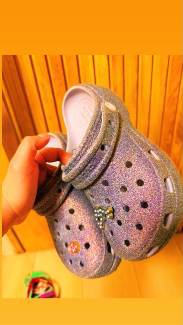 Glitter Crocs with Charms (Category: Slippers and slides) located in Quezon City. Submitted by azir88 (Listing ID 1455661695, Image 3). Description: - Sparkly glitter Crocs - Comes with cute charms already attached - Easy slip-on and off design - Super comfy for casual wear and lounging - Unique shimmer effect.