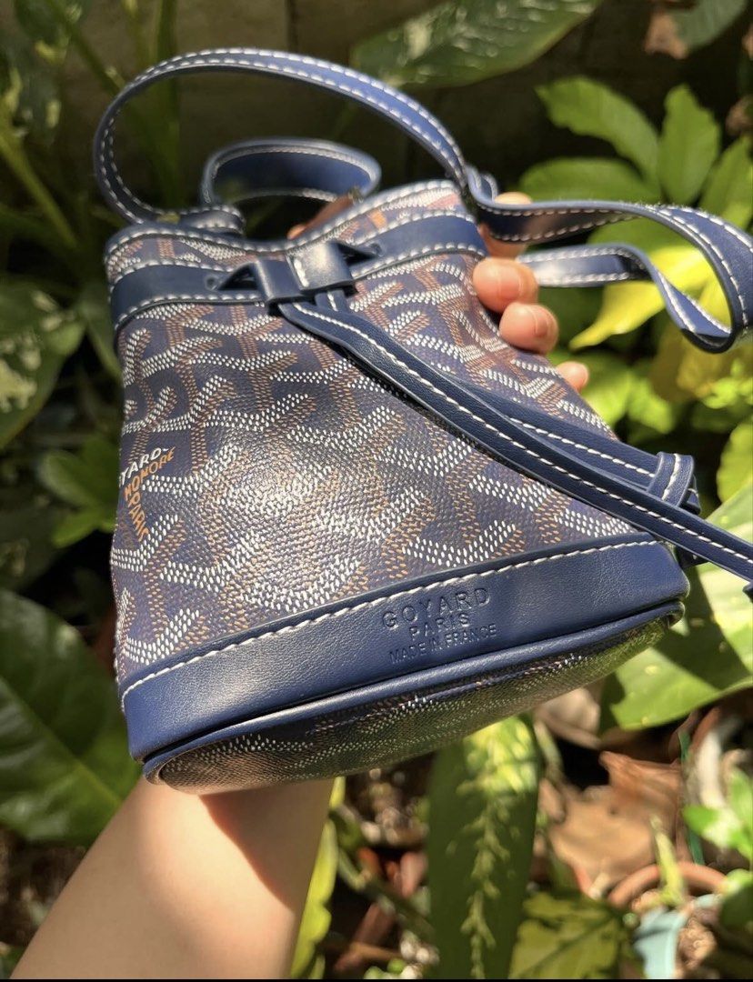 Goyard Mini Saigon Bucket Bag Navy (Category: Luxury Bags & Wallets) located in Iloilo. Submitted by graceusi0796113 (Listing ID 1455517536, Image 1). Description: - Authentic Goyard Mini Saigon Bucket Bag - Color: Navy Blue - Material: Signature Goyardine Canvas with Leather Trim - Closure: Drawstring - Interior: Canvas Lined - Size: Mini, ideal for phone and essentials - MOP : Gcash/BPI - SF c/o Buyer - LBC / J&T - Shipping every Thursday - Sli