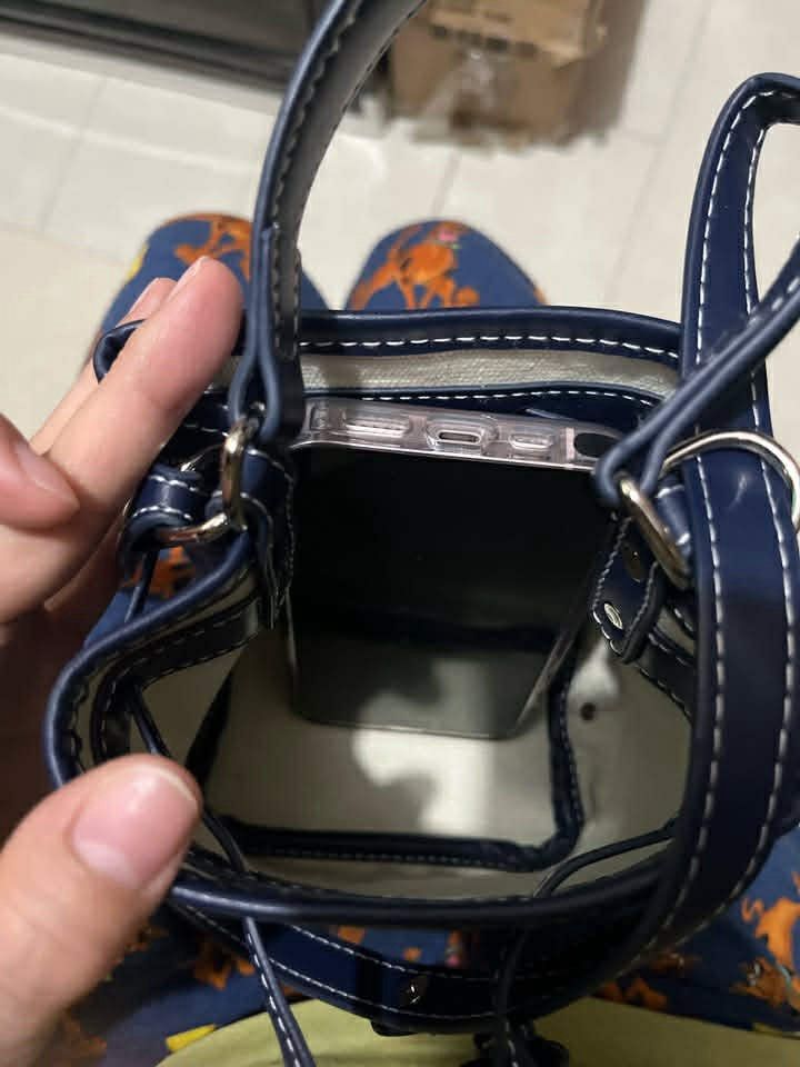 Goyard Mini Saigon Bucket Bag Navy (Category: Luxury Bags & Wallets) located in Iloilo. Submitted by graceusi0796113 (Listing ID 1455517536, Image 3). Description: - Authentic Goyard Mini Saigon Bucket Bag - Color: Navy Blue - Material: Signature Goyardine Canvas with Leather Trim - Closure: Drawstring - Interior: Canvas Lined - Size: Mini, ideal for phone and essentials - MOP : Gcash/BPI - SF c/o Buyer - LBC / J&T - Shipping every Thursday - Sli