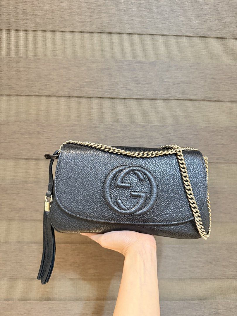 Gucci Soho Flap Bag (Category: Luxury Bags & Wallets) located in Manila. Submitted by sweetluxuryph (Listing ID 1455628894, Image 3). Description: - Authentic Black Leather Gucci Soho Flap Bag - Features Gold Chain Strap and Iconic Tassel Detail - Comes with Complete Set: Dust Bag & Authenticity Cards - Original Store Price Approx. ₱180,000 - Excellent Value - Don't Miss Out!.