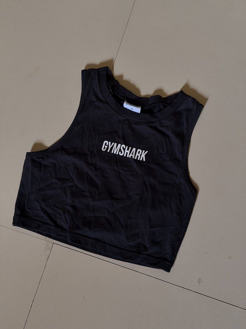 Gymshark Black Cropped Tank Top (Category: Activewear) located in Oroquieta. Submitted by rjayy14 (Listing ID 1455660135, Image 1). Description: - Brand: Gymshark - Type: Cropped Tank Top - Color: Black - Size: Medium (M) - Neckline: Crew Neck - Sleeves: Sleeveless - Features: Gymshark logo on front - Ideal for: Workouts, gym sessions, casual wear - Material: Comfortable and breathable.