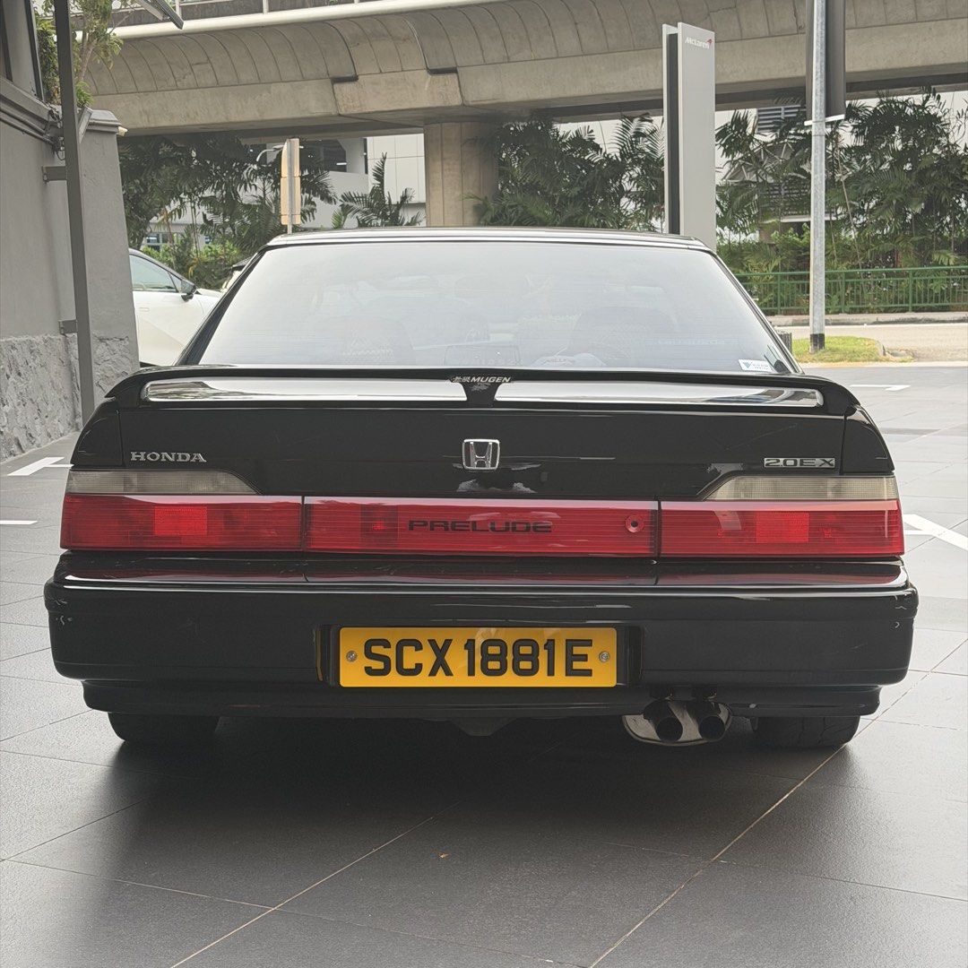 Honda Prelude 2.0M Manual (Category: Used Cars) located in Singapore. Submitted by jdmaftermarket (Listing ID 1455577799, Image 3). Description: No dealers pls, not looking for consignment. 3 left in sg, black plate. A car with character, pop up lights, 80s wedge shape, sunroof, can sit 5 pax and a giant rear boot space. Only one with rare dark blue interior. Engine overhauled + car resprayed at 310,000km, almost everything has been replaced. Sam