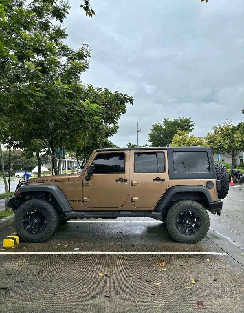 Jeep Wrangler Rubicon 4-Dr (A) (Category: New Cars) located in Manila. Submitted by gabby_villaluz (Listing ID 1455332206, Image 1). Description: 2015 Jeep Wrangler Rubicon CRD - First owned. Owner seller. - 62,+++ kilometers only. - Top of the line. - Original Copper Brown Color. Rare. 1 of only 3 in the Philippines. - Diesel Fuel - TRUE RUBICON variant, not sticker. Meaning these have the stronger front and rear DANA 44 axles, with bigger geari