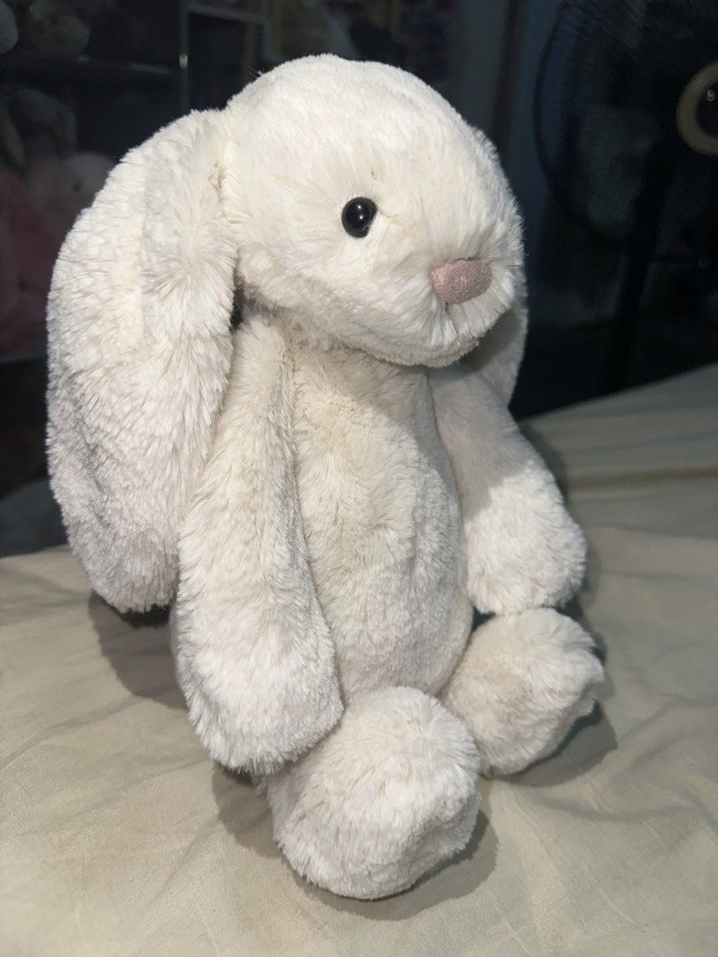 JELLYCAT White Medium Bashful Bunny (Category: Plushies & Soft Toys) located in Pasig City. Submitted by katplush_superlove (Listing ID 1455566639, Image 2). Description: Approx 12 inches long Good as new New let go item Only displayed Payment first Loc Pasig City possible Lalamove J&T also possible .