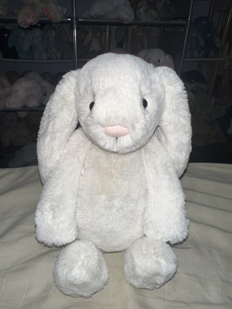 JELLYCAT White Medium Bashful Bunny (Category: Plushies & Soft Toys) located in Pasig City. Submitted by katplush_superlove (Listing ID 1455566639, Image 1). Description: Approx 12 inches long Good as new New let go item Only displayed Payment first Loc Pasig City possible Lalamove J&T also possible .