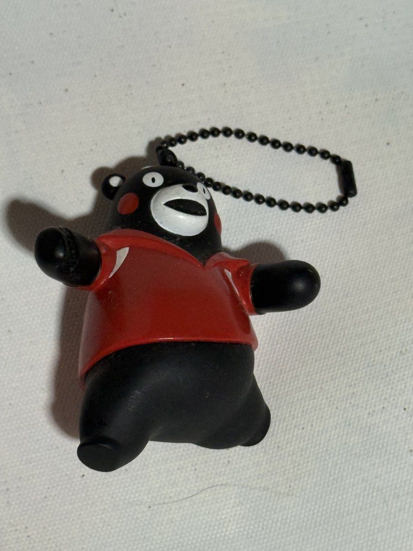 Kumamon Bear Keychain Red Shirt (Category: Character Goods) located in Manila. Submitted by purchaeses (Listing ID 1455651060, Image 1). Description: - Adorable Kumamon bear keychain - Features a cute red shirt - No Tennis racket - Comes with a convenient ball chain - Ideal for decorating bags or keys - A small, collectible item.