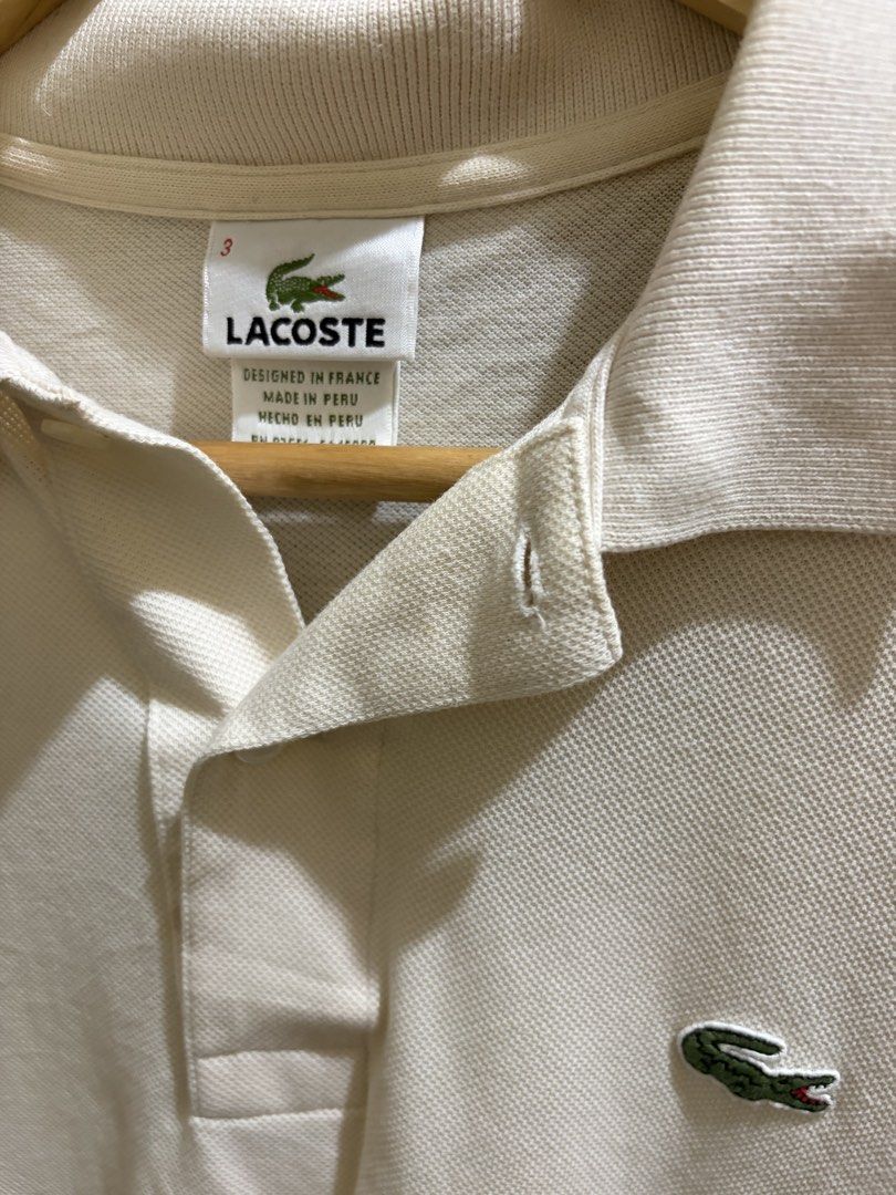 Lacoste Cream Polo Shirt (Category: Tshirts & Polo Shirts ) located in Batangas. Submitted by milxsells (Listing ID 1455656148, Image 2). Description: 20/27 no issue excellent condition color rate: 9.8/10 authentic.
